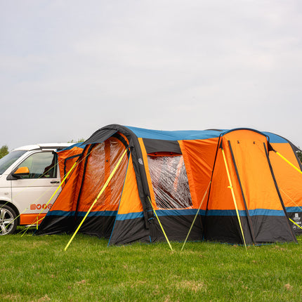 Charcoal and Orange OLPRO Cocoon Breeze V2 awning in camping field
