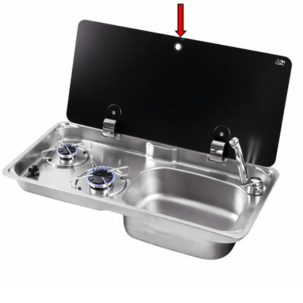 Compact kitchen setup with stove and sink on a white background